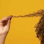 Read more about the article 5 Ways to Beat the Hair Frizz Blues!